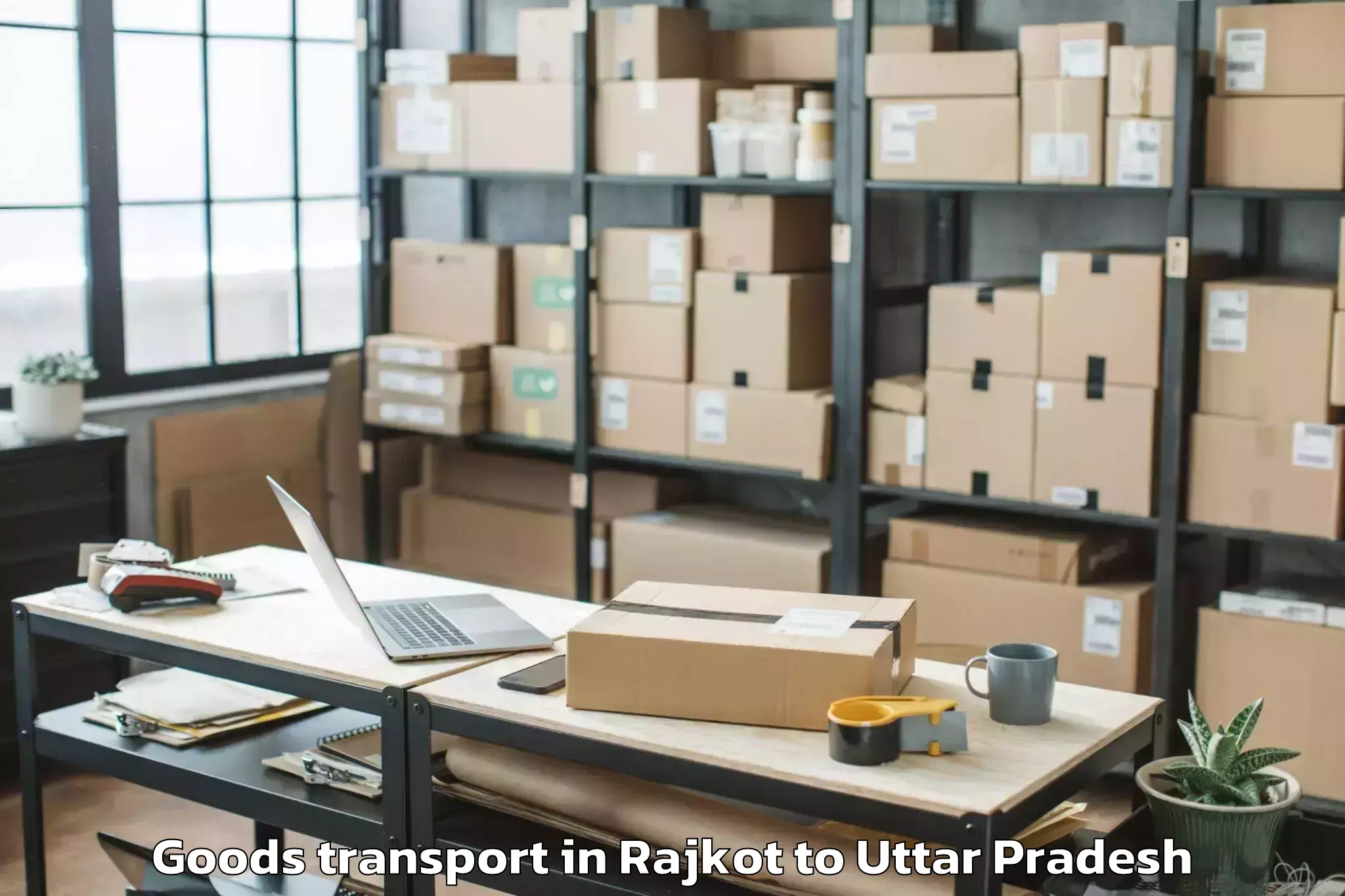 Professional Rajkot to Khadda Goods Transport